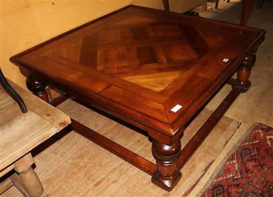 A modern square topped coffee table